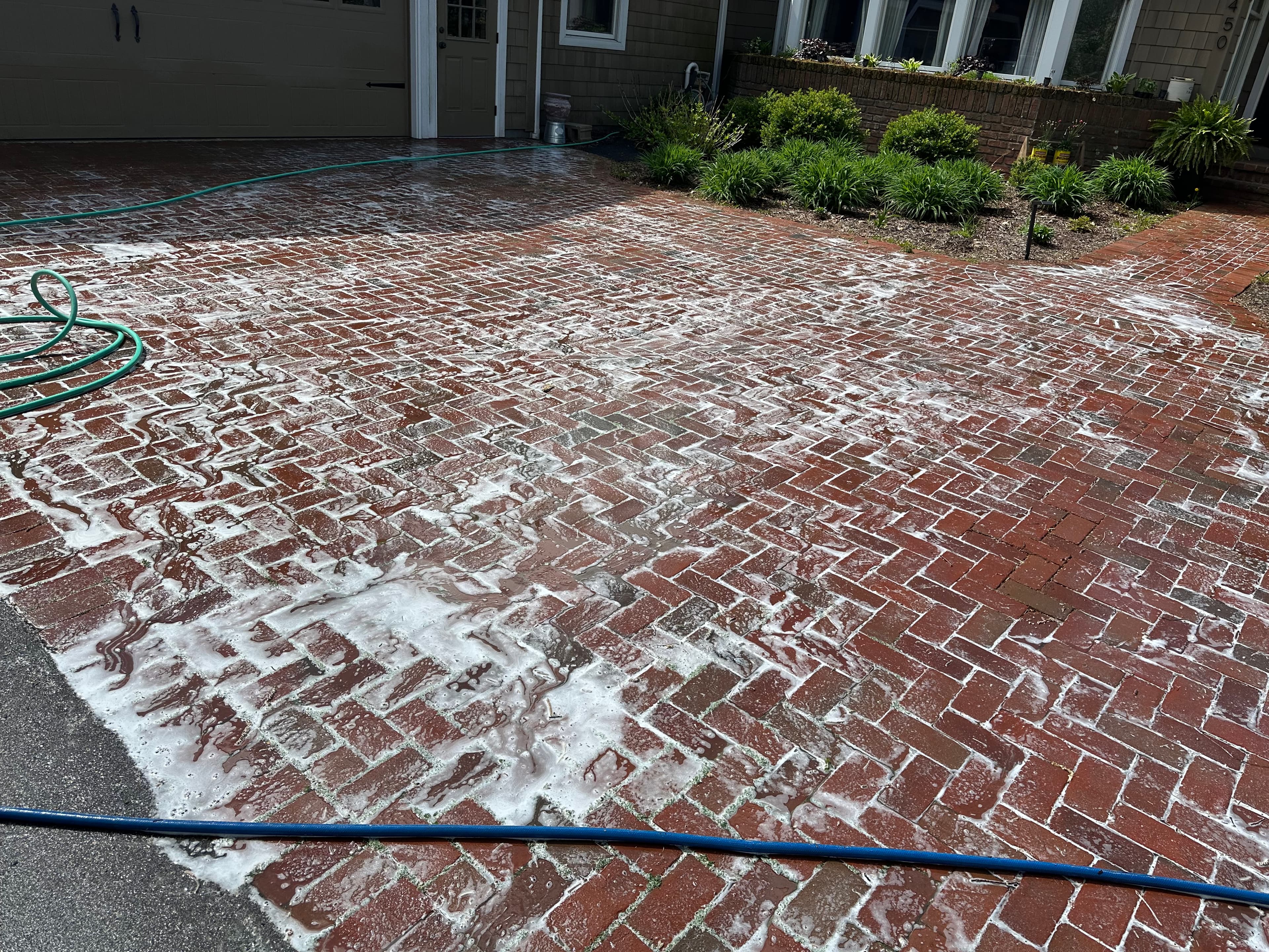 Oshkosh brick paver edge restraint repair and heavy clay soil drainage correction